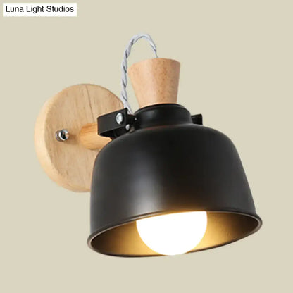 Black brass wood sconce with black metal shade and natural wood backplate, cork accent on Tampa Home & Garden Store