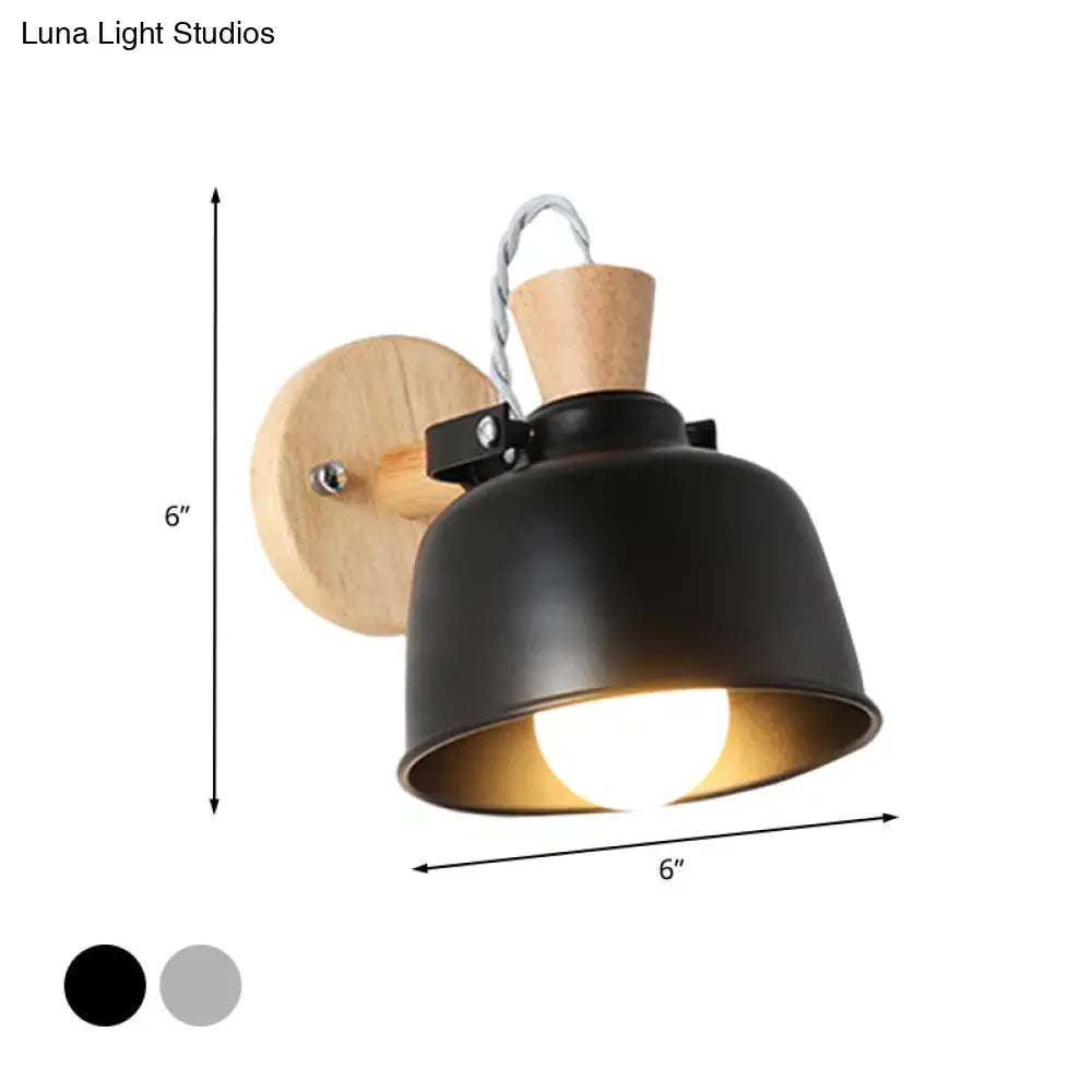 Black brass wood sconce by Decorbites with natural wood backplate and rope hanger on Tampa Home & Garden Store