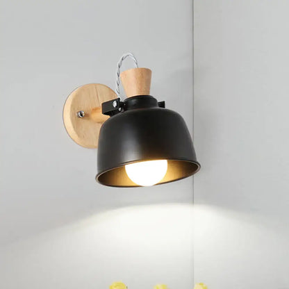 Black brass wood sconce by Decorbites; wall lamp with black shade and wood backplate on Tampa Home & Garden Store