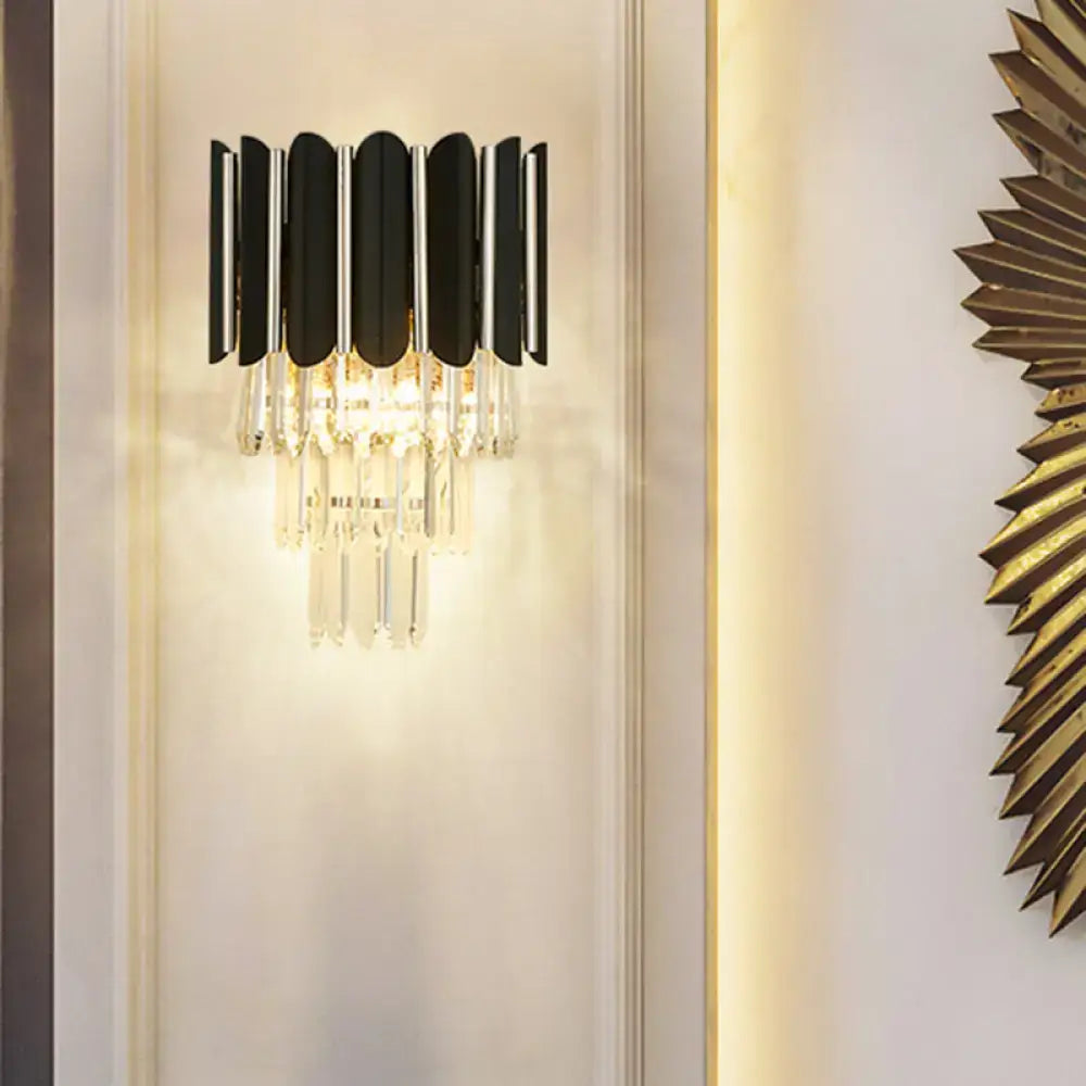 Black crystal tiered wall sconce with hanging prisms for bedroom lighting Decorbites on Tampa Home & Garden Store