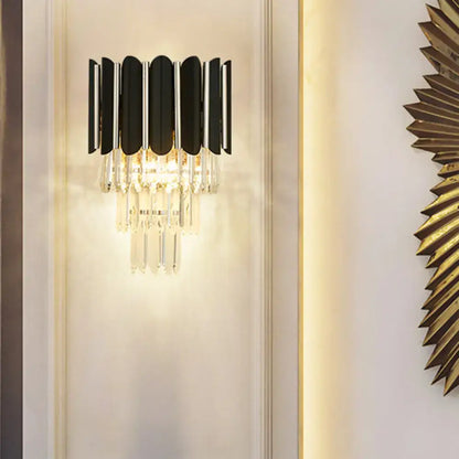 Black crystal tiered wall sconce with hanging prisms for bedroom lighting Decorbites on Tampa Home & Garden Store