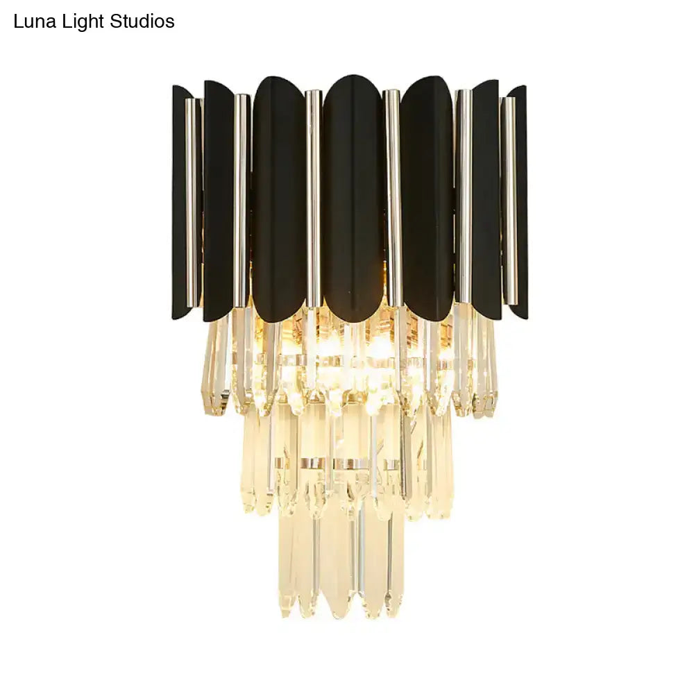 Black crystal tiered wall sconce with black curved panels and cascading clear prisms on Tampa Home & Garden Store