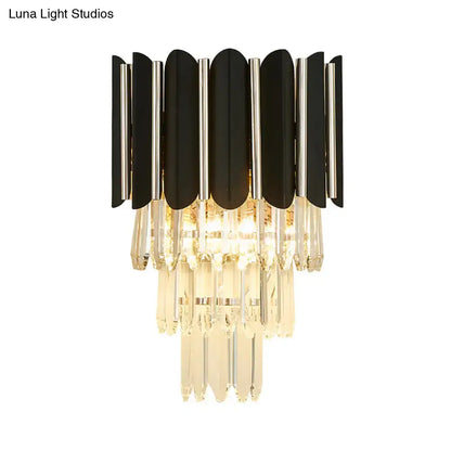 Black crystal tiered wall sconce with black curved panels and cascading clear prisms on Tampa Home & Garden Store