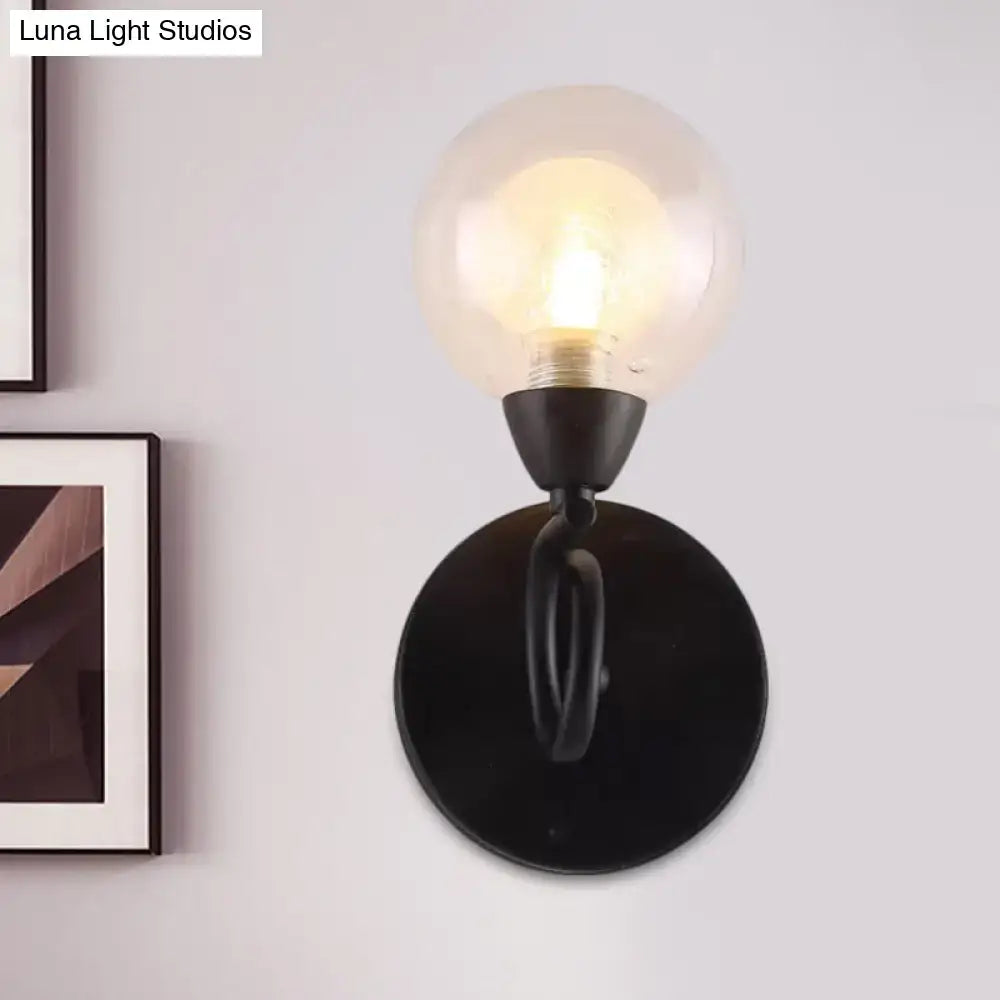 Black Clear Glass Sleek Wall Lamp by Decorbites with black backplate and clear glass globe on Tampa Home & Garden Store