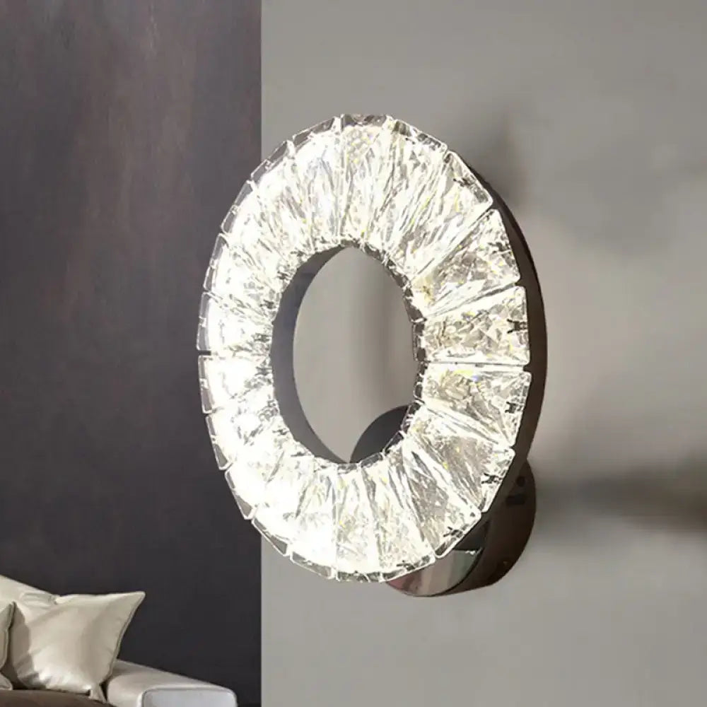 Crystal chrome wall sconce with a circular ring of crystals on a chrome mount by Decorbites on Tampa Home & Garden Store