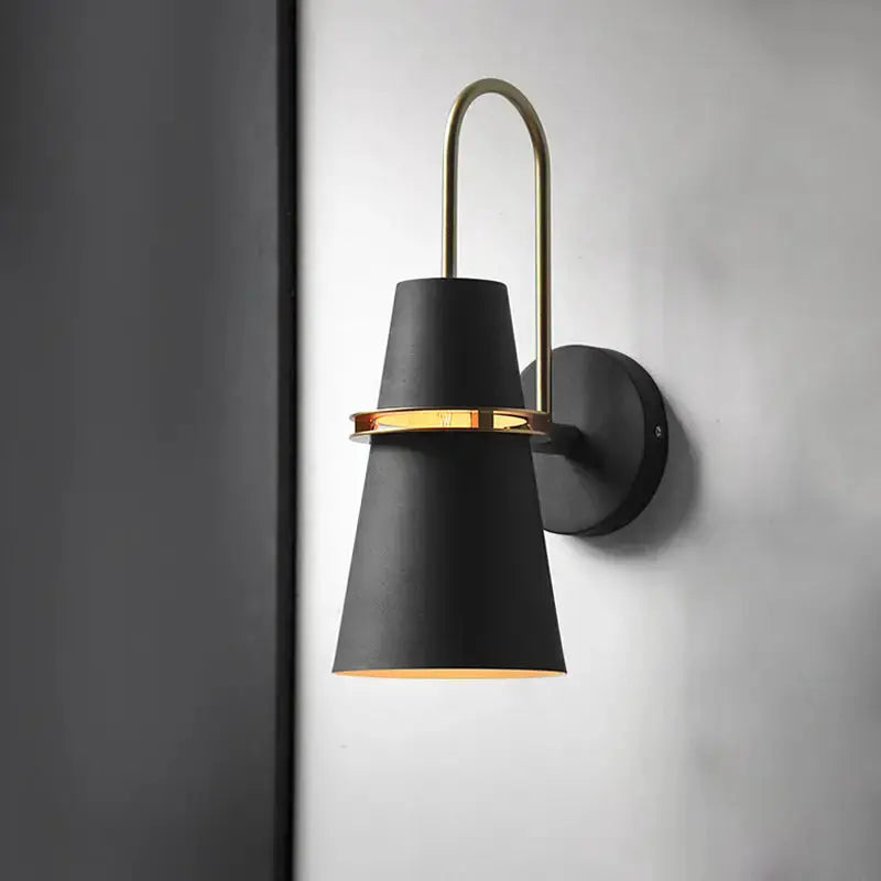 Modern black conical sconce wall lamp by Decorbites with gold ring and arm for dining room on Tampa Home & Garden Store