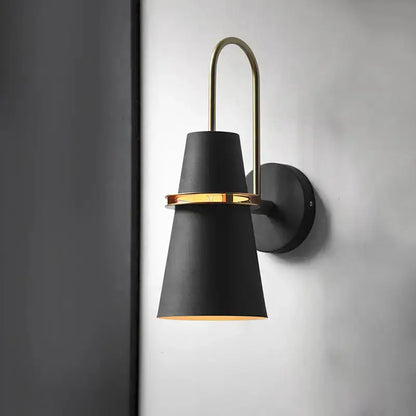 Modern black conical sconce wall lamp by Decorbites with gold ring and arm for dining room on Tampa Home & Garden Store