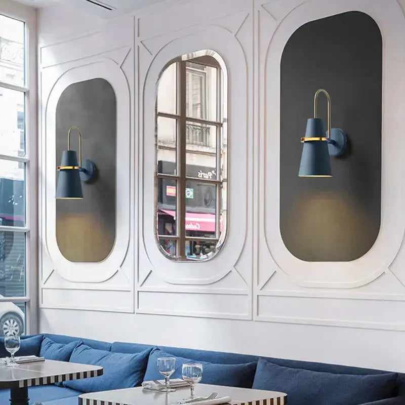 Modern black and gold conical wall sconce with blue shade by Decorbites, pair on panel wall on Tampa Home & Garden Store