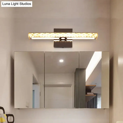 Gold Crystal Wall Light by Decorbites, crystal-embellished gold bar above a mirrored cabinet on Tampa Home & Garden Store
