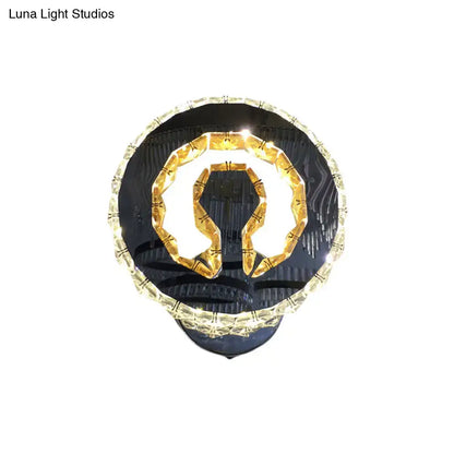 Chrome beveled crystal wall sconce with gold inner ring circular design by Decorbites on Tampa Home & Garden Store