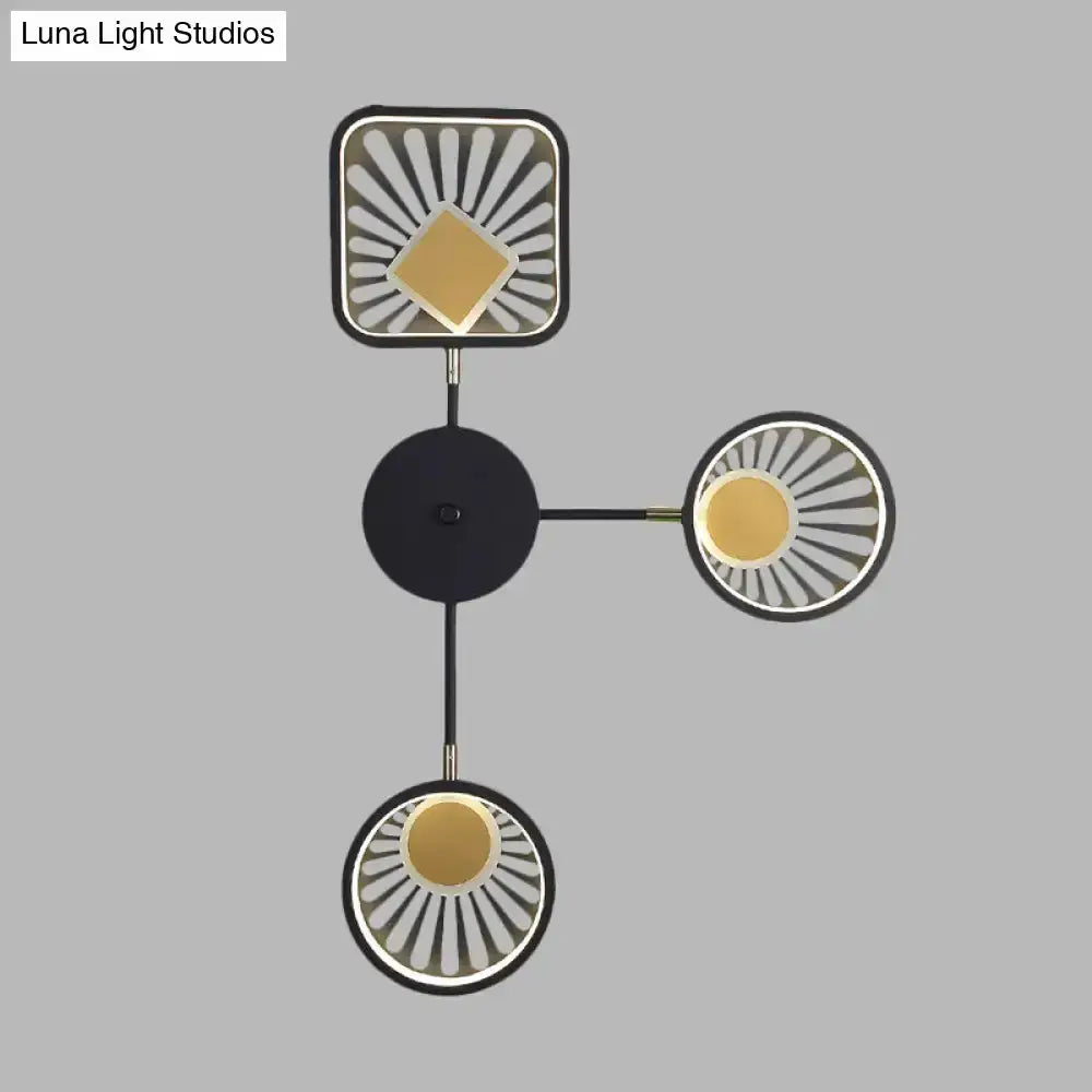 Modern black and gold sunburst LED wall sconce three-headed by Decorbites on Tampa Home & Garden Store