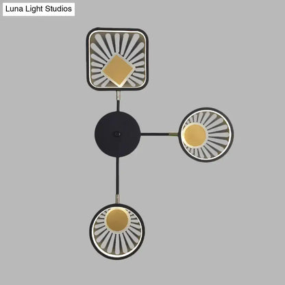 Modern black and gold sunburst LED wall sconce three-headed by Decorbites on Tampa Home & Garden Store