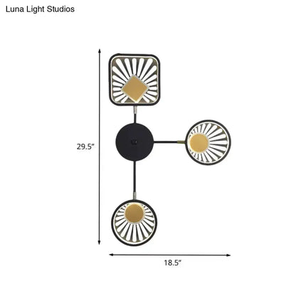 Modern black and gold sunburst LED wall sconce with three sunburst discs Decorbites on Tampa Home & Garden Store