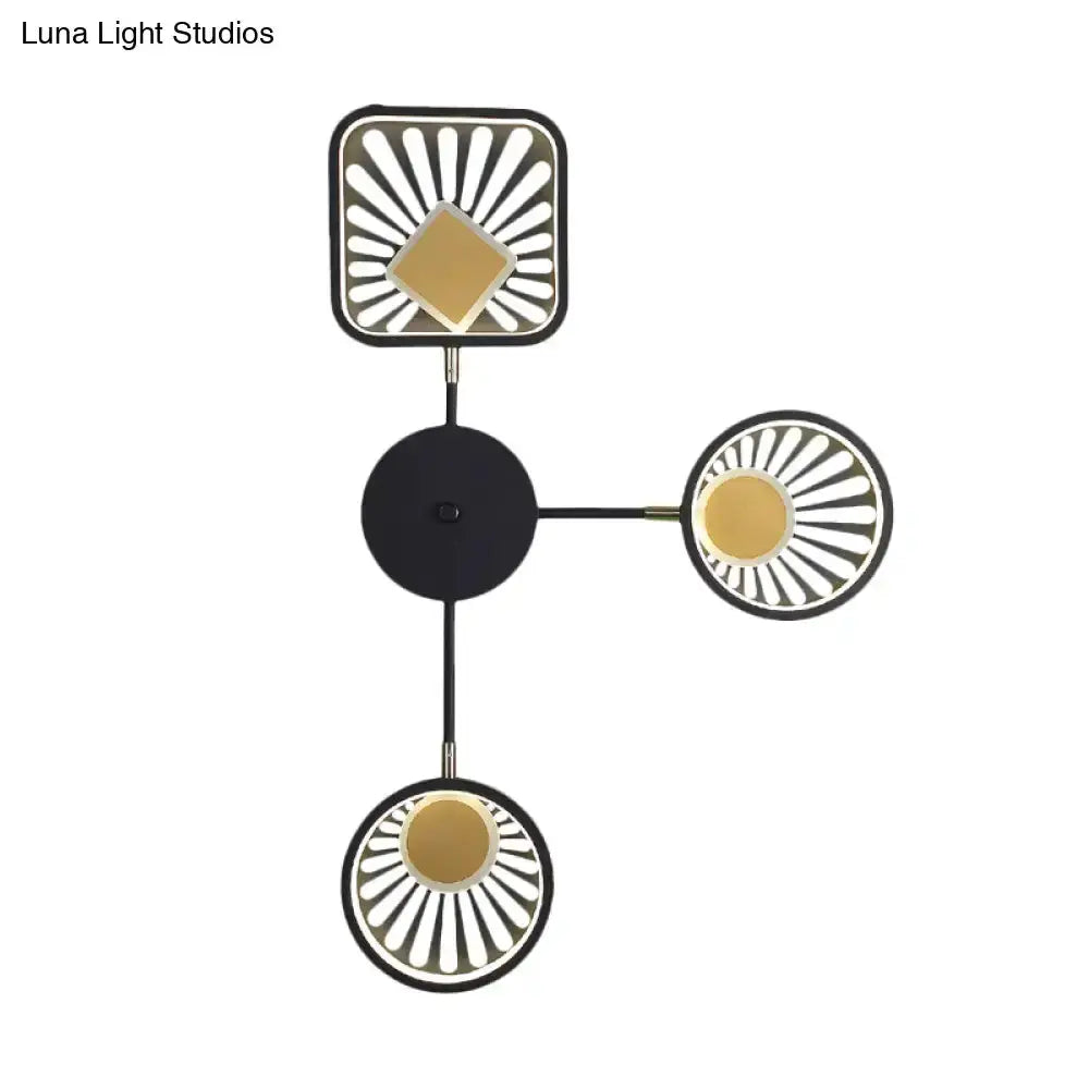 Modern black and gold sunburst LED wall sconce with 4 light heads by Decorbites on Tampa Home & Garden Store
