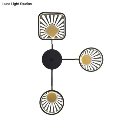 Modern black and gold sunburst LED wall sconce with 4 light heads by Decorbites on Tampa Home & Garden Store