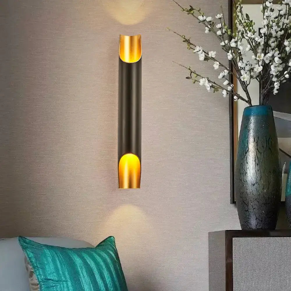 Decorbites Black Gold Tubular Sconce wall light with warm gold interior on Tampa Home & Garden Store