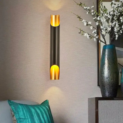 Decorbites Black Gold Tubular Sconce wall light with warm gold interior on Tampa Home & Garden Store