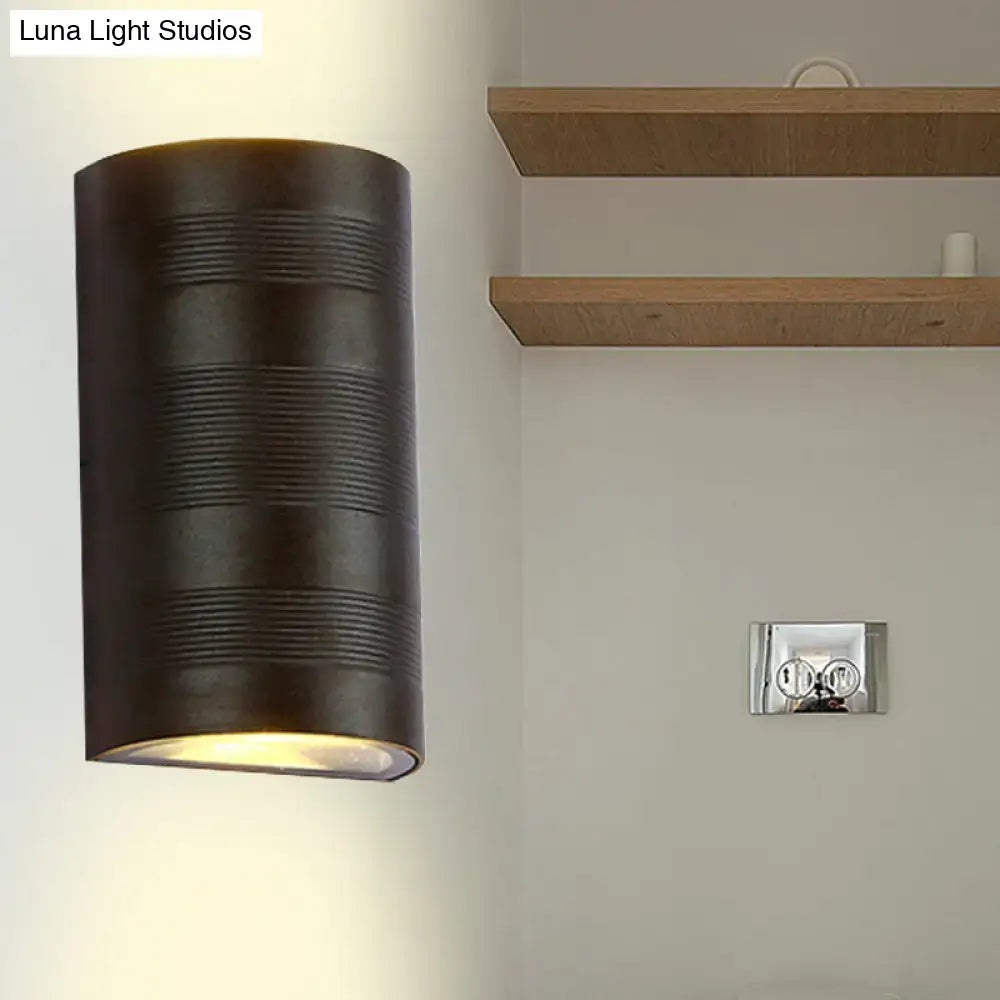 Black metal half-cylinder outdoor wall lamp with ridged bands by Decorbites on Tampa Home & Garden Store