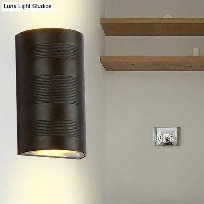 Black metal half-cylinder outdoor wall lamp with ridged bands by Decorbites on Tampa Home & Garden Store