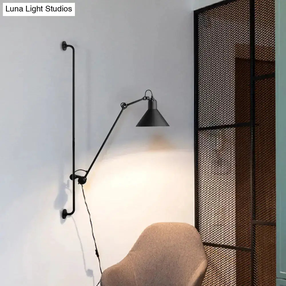 Modern black articulated bedroom wall lamp with adjustable arm and conical shade direct wired on Tampa Home & Garden Store
