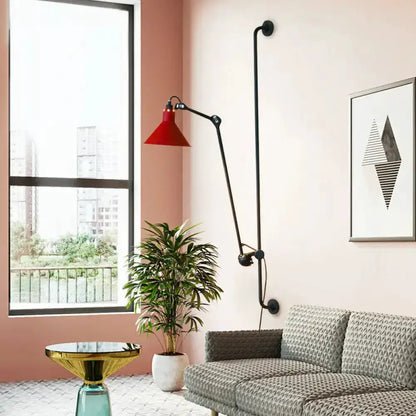 Modern articulated wall lamp Decorbites with black metal frame and red shade on Tampa Home & Garden Store