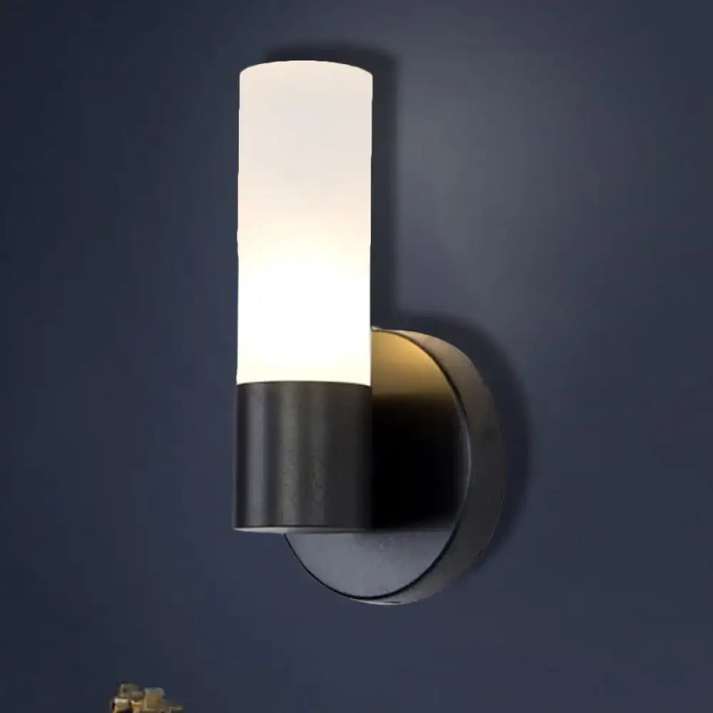 Black Glass Warm-Glow Wall Sconce with frosted glass shade and black metal wall mount on Tampa Home & Garden Store