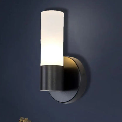 Black Glass Warm-Glow Wall Sconce with frosted glass shade and black metal wall mount on Tampa Home & Garden Store