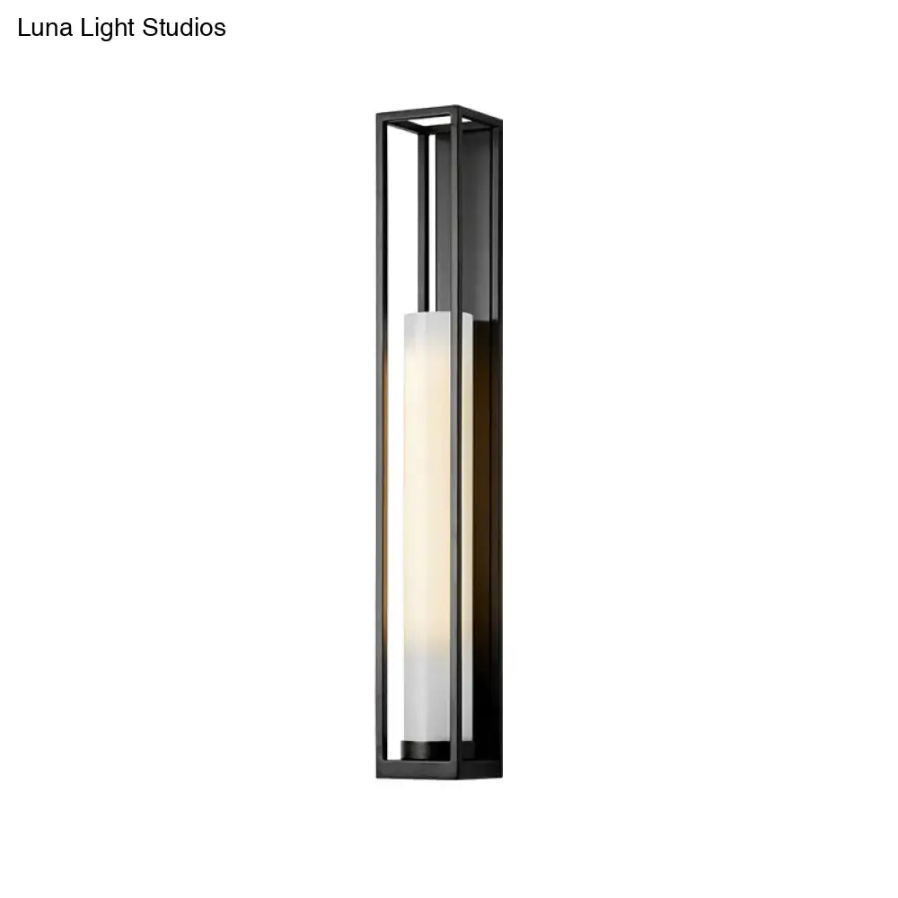 White Glass Tubular Sconce in a black metal frame by Decorbites on Tampa Home & Garden Store