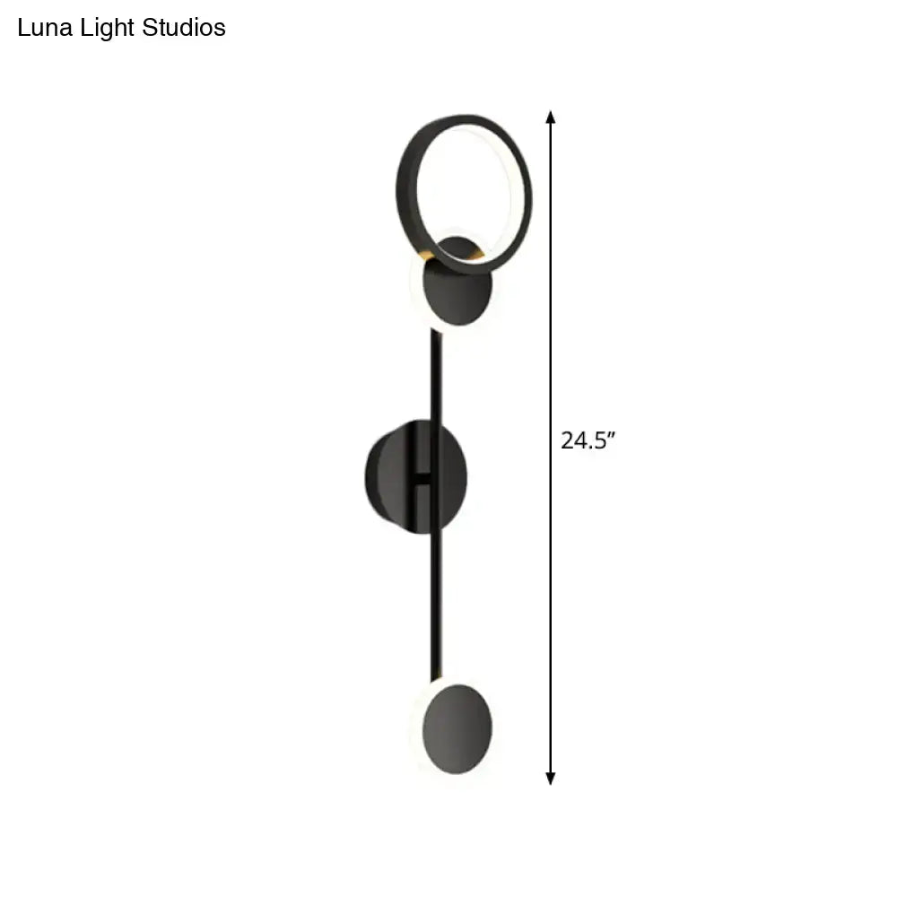 Black metallic wall sconce with circular ring light and vertical rod, 24.5 in tall, Decorbites on Tampa Home & Garden Store