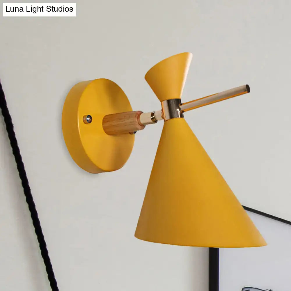 Black Angle Wall Sconce with yellow conical shade and wooden arm on Tampa Home & Garden Store