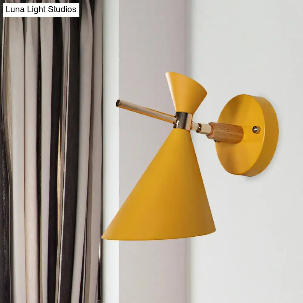 Black Angle Wall Sconce with yellow conical shade and wood arm on Tampa Home & Garden Store