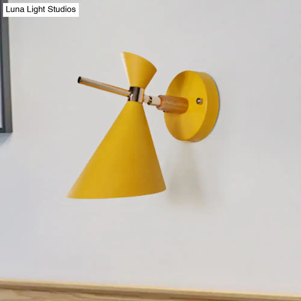 Decorbites yellow angle wall sconce with conical shade and wooden arm on round wall mount on Tampa Home & Garden Store