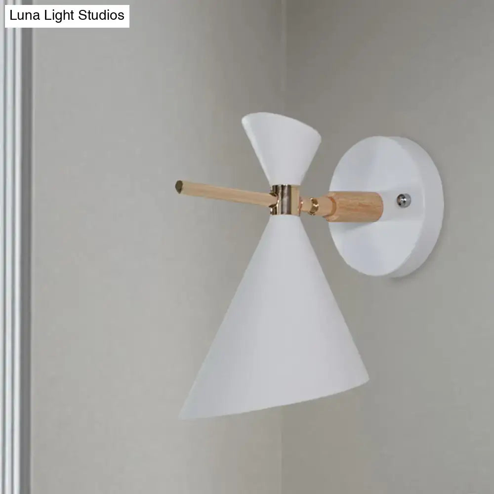 Black angle wall sconce by Decorbites with white cone shade and wooden arm on wall mount on Tampa Home & Garden Store