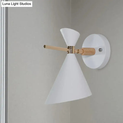 Black angle wall sconce by Decorbites with white cone shade and wooden arm on wall mount on Tampa Home & Garden Store