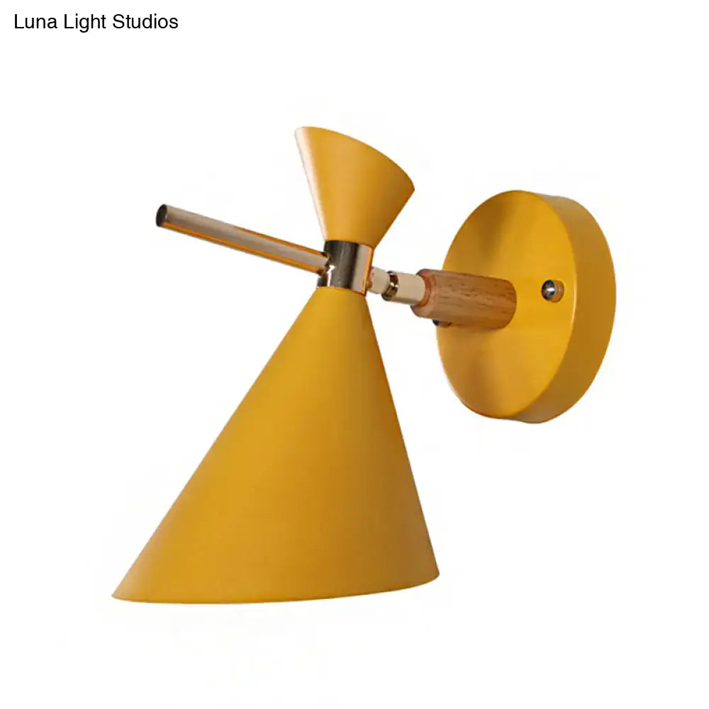 Yellow angular wall sconce with conical shade and wood arm for modern decor on Tampa Home & Garden Store