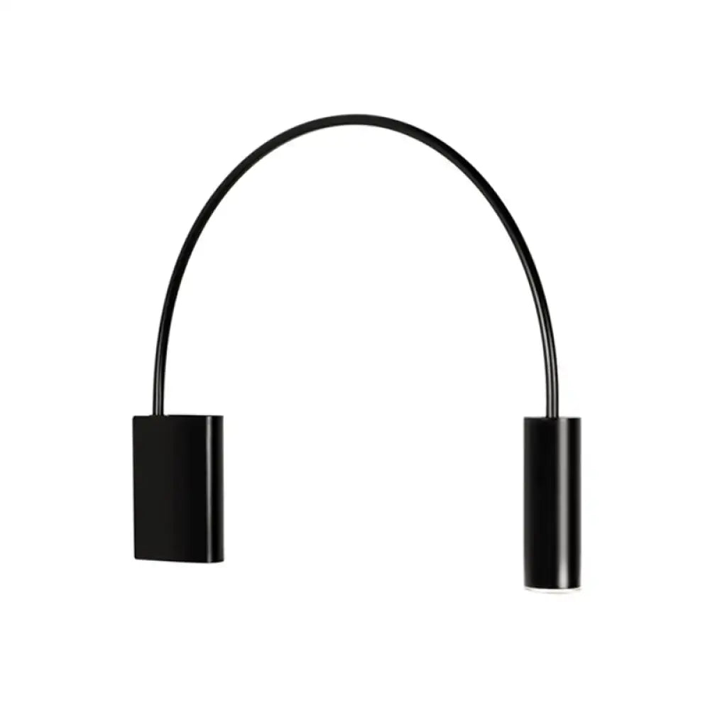 Black arched LED wall light by Decorbites with curved metal arm and dual end modules on Tampa Home & Garden Store