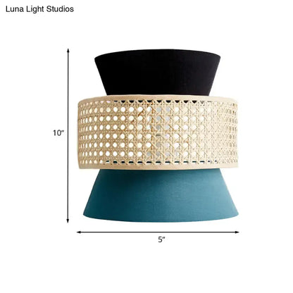 Blue Rattan Wall Sconce with beige woven center, black top cap, teal base on Tampa Home & Garden Store