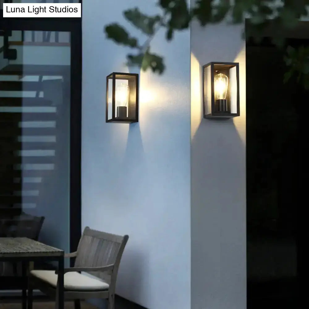 Decorbites modern black box patio wall sconce with glass enclosure, two outdoor lanterns on Tampa Home & Garden Store