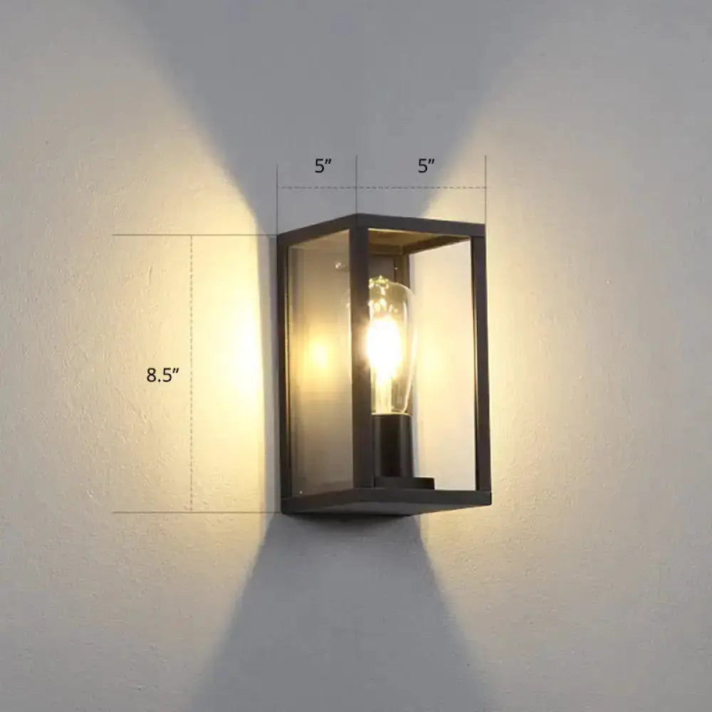 Modern black metal box patio wall sconce with glass panels and exposed bulb for outdoor lighting on Tampa Home & Garden Store