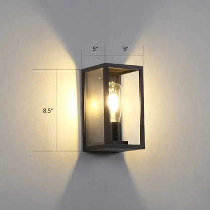 Modern black metal box patio wall sconce with glass panels and exposed bulb for outdoor lighting on Tampa Home & Garden Store