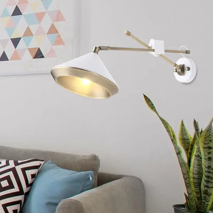 Black brass arm wall sconce with white cone shade by Decorbites on Tampa Home & Garden Store
