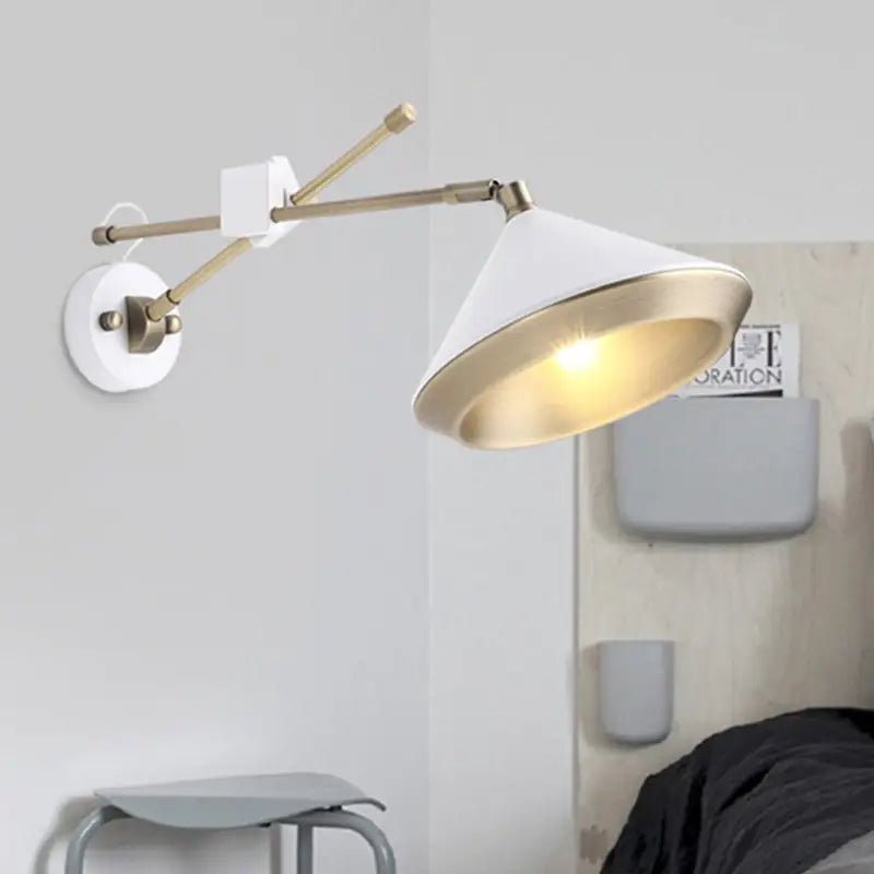 Black brass arm wall sconce with white conical shade and adjustable brass arms on Tampa Home & Garden Store