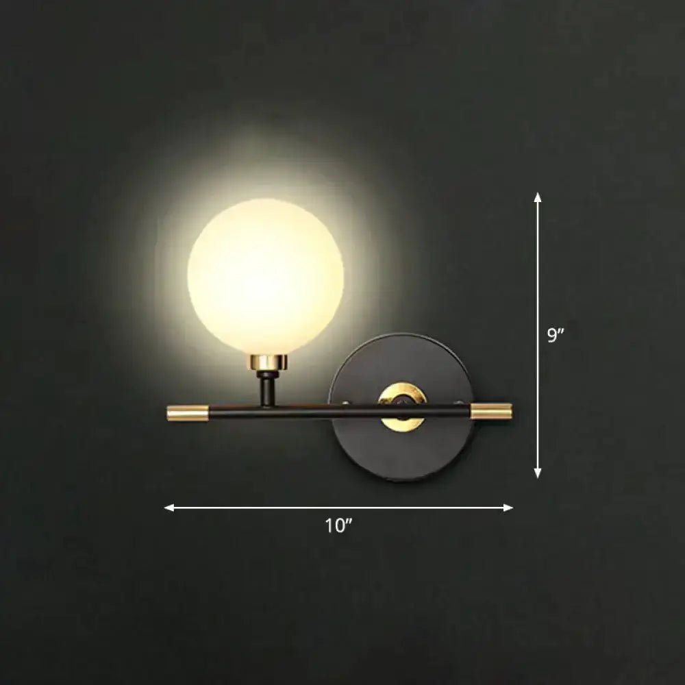 Modern Black and Brass Glass Ball Bedside Sconce