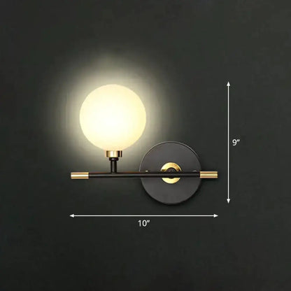 Modern Black and Brass Glass Ball Bedside Sconce