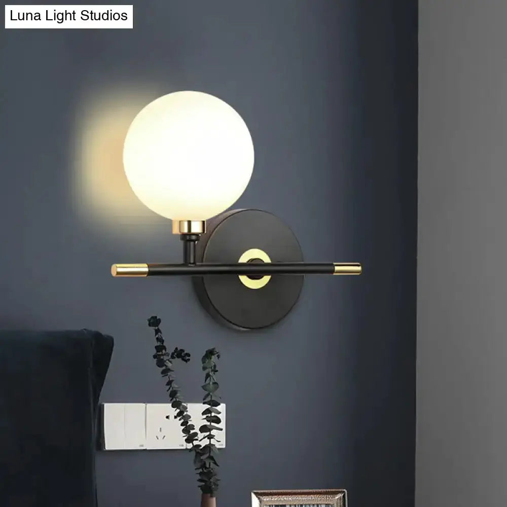 Modern Black and Brass Glass Ball Bedside Sconce