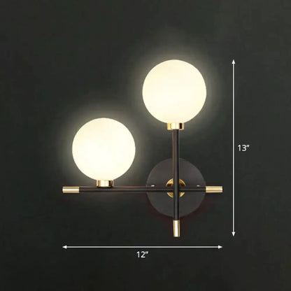 Modern Black and Brass Glass Ball Bedside Sconce
