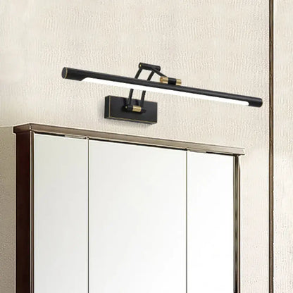 Vanity light black brass wall fixture with horizontal bar and brass accents on Tampa Home & Garden Store