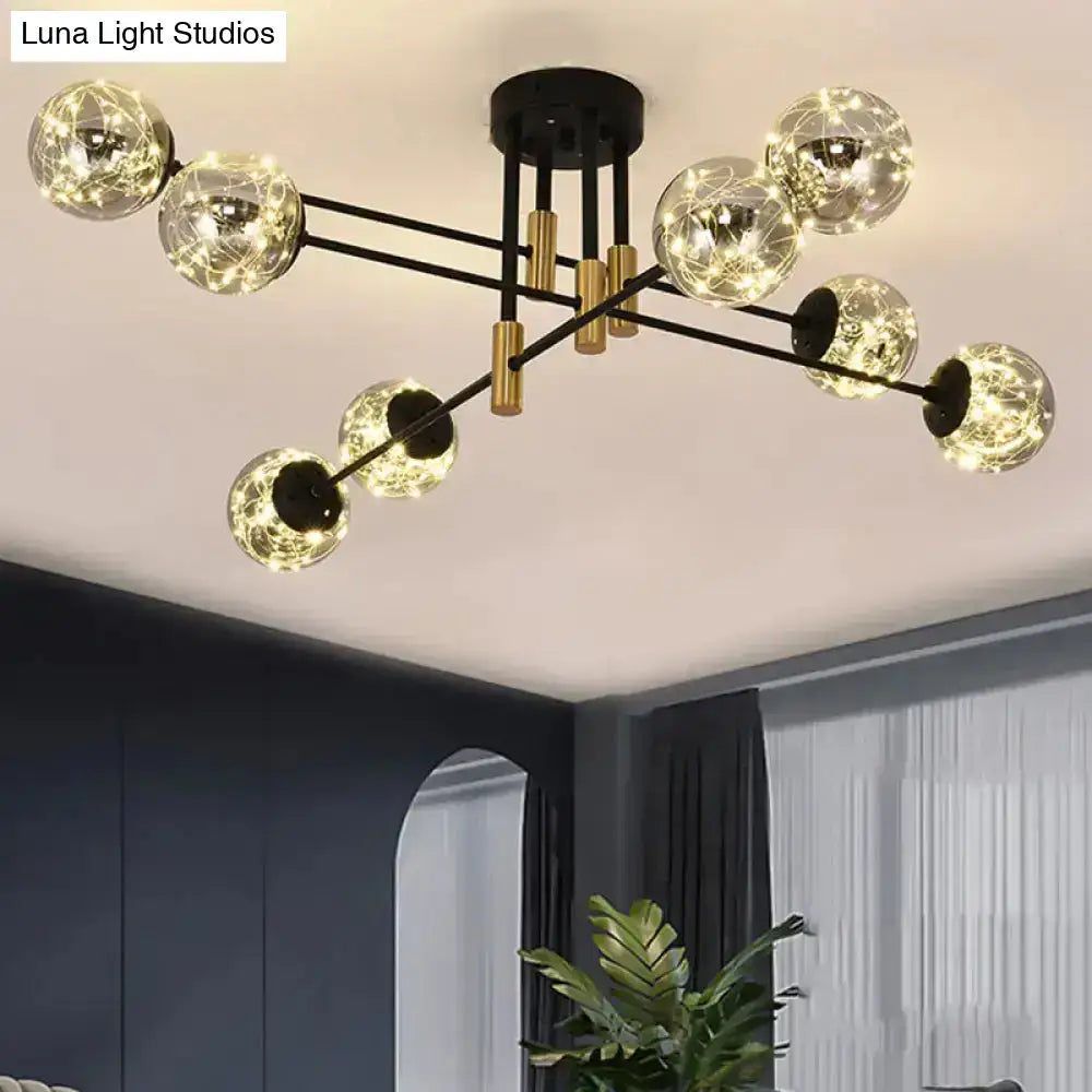 Black brass ball light fixture with glass globe bulbs, Sputnik-style chandelier by Decorbites on Tampa Home & Garden Store