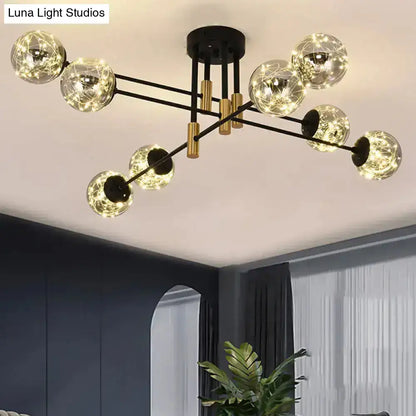 Black brass ball light fixture with glass globe bulbs, Sputnik-style chandelier by Decorbites on Tampa Home & Garden Store