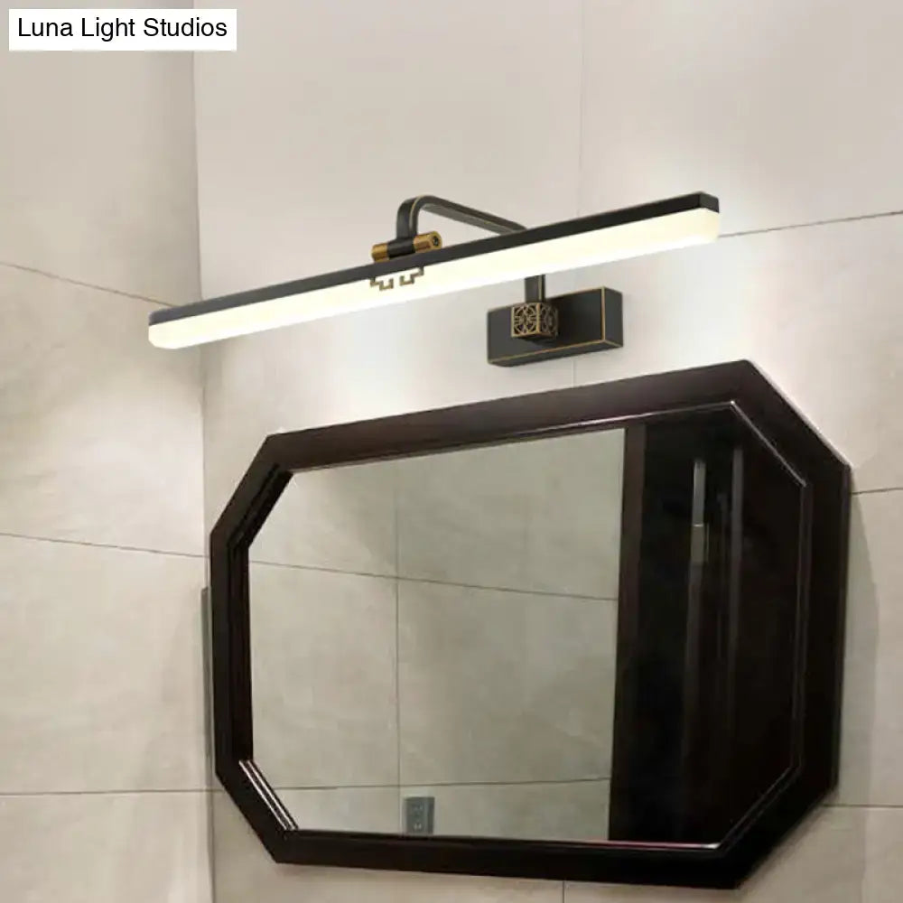 Black Brass Linear Adjustable Vanity Light Decorbites above an octagonal black-framed mirror on Tampa Home & Garden Store